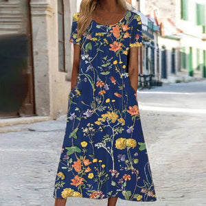 HERA – Maxikleid im Bohemian-Stil mit Blumenmuster und Taschen | Kurzärmliges Maxikleid mit Blumenmuster im Boho-Chic-Stil für Damen